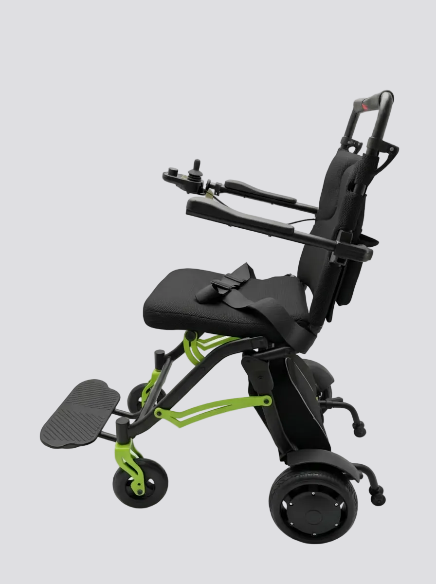 Black and green mobility scooter on a white background