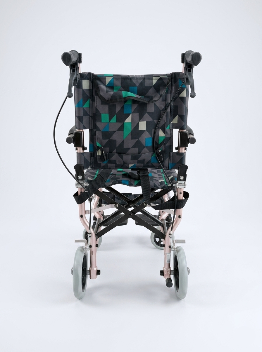 Foldable travel wheelchair with geometric pattern on a white background