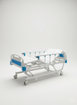 Hospital bed with blue accents on a white background