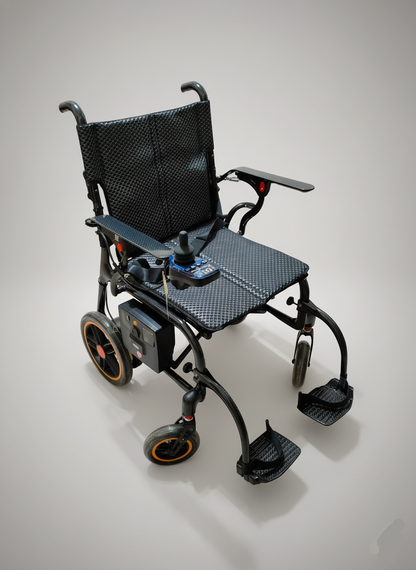 Black electric wheelchair on a gray background