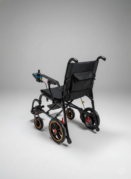 Black folding wheelchair on a gray background