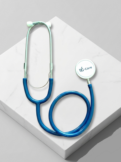 Blue and green stethoscope on a white surface with 'UG Care' branding.