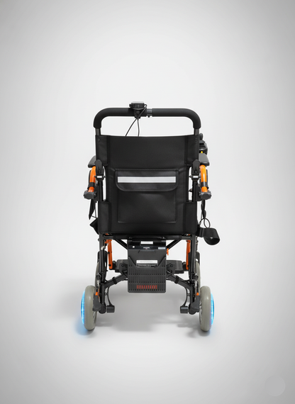 Black electric wheelchair with blue wheels on a gray background