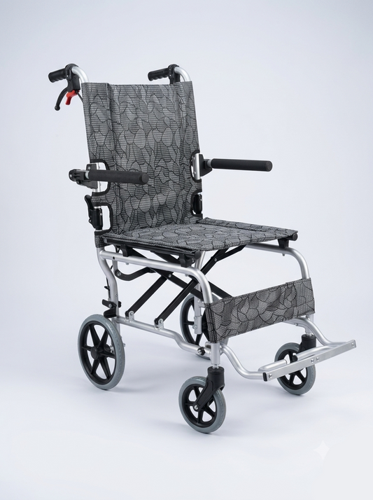 Compact folding wheelchair with gray patterned seat on a white background